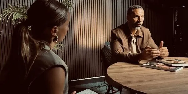 Rose McLean in conversation with a client